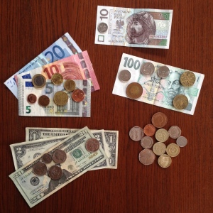 Some of the currency I've accrued throughout my travels abroad. Clockwise from bottom left: American Dollars, Euros, Polish Zloty, Czech Koruna, British Pounds.