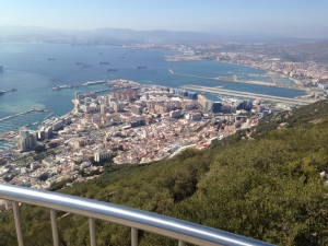 Aerial view of Gibraltar in the foreground and Spain behind.