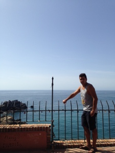 Carlos in front of the Mediterranean.